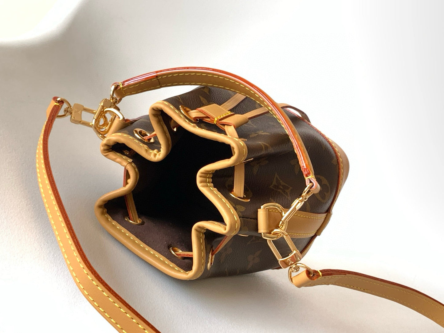 NANO NOÉ 16 IN BROWN MONOGRAM CALFSKIN