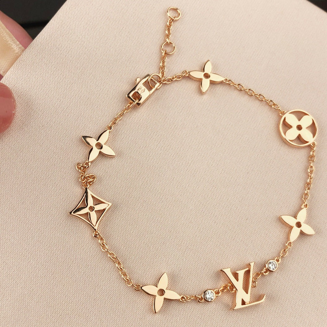 [AURORA]STAR AND SUN 7 MOTIFS GOLD BRACELET