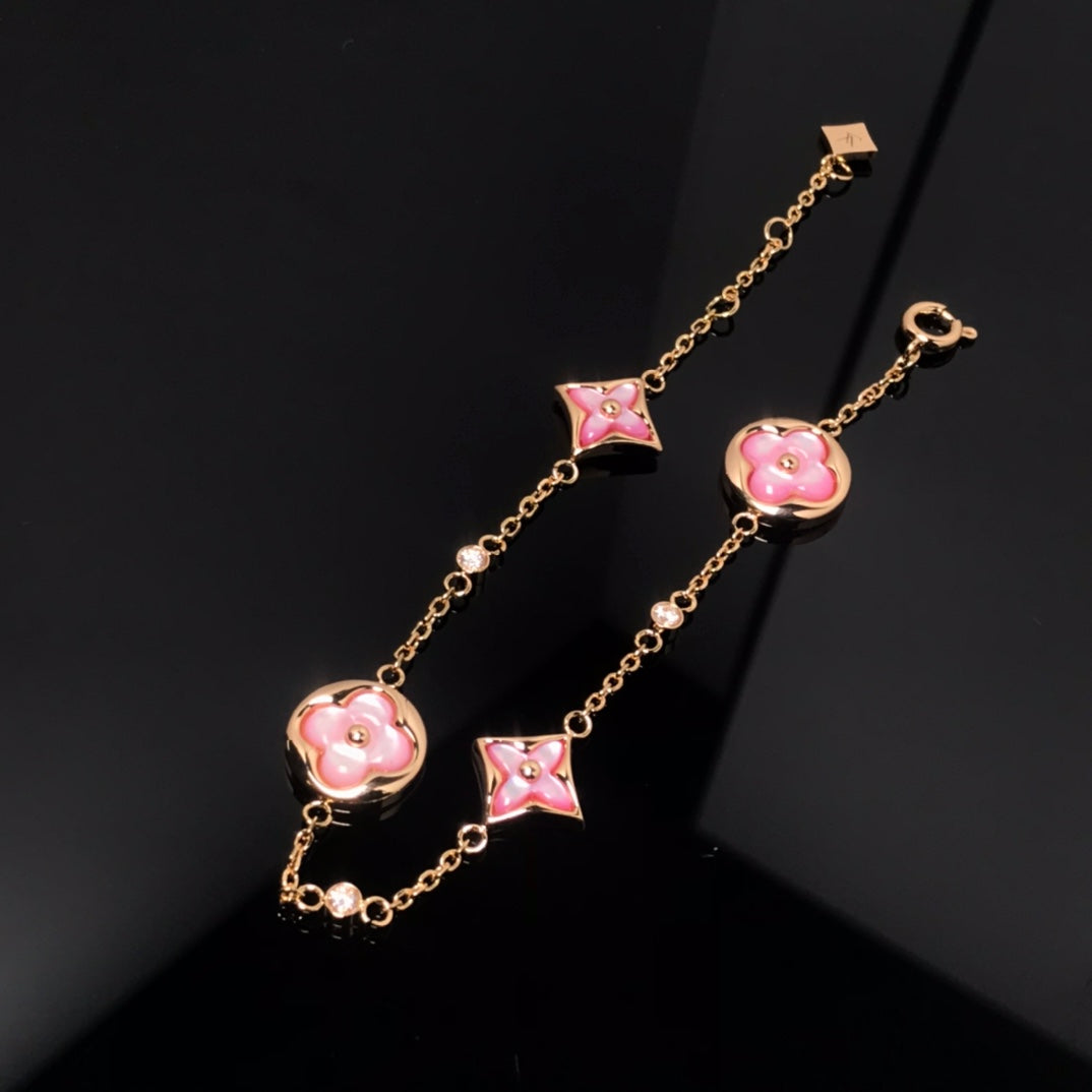 [AURORA]STAR AND SUN 4 MOTIF PINK MOP PINK GOLD BRACELET