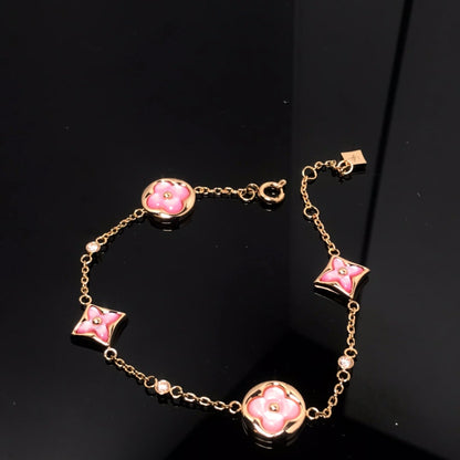 [AURORA]STAR AND SUN 4 MOTIF PINK MOP PINK GOLD BRACELET