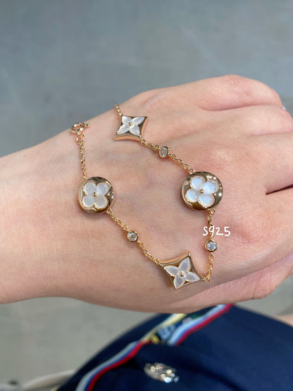 [AURORA]STAR AND SUN 4 MOTIF WHITE MOP PINK GOLD BRACELET