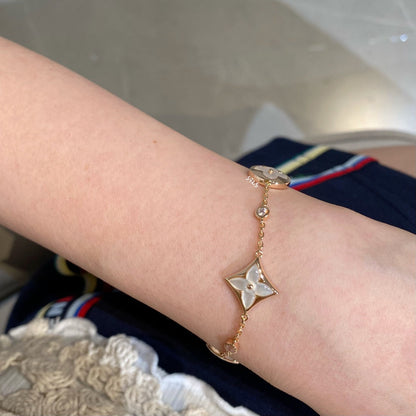 [AURORA]STAR AND SUN 4 MOTIF WHITE MOP PINK GOLD BRACELET