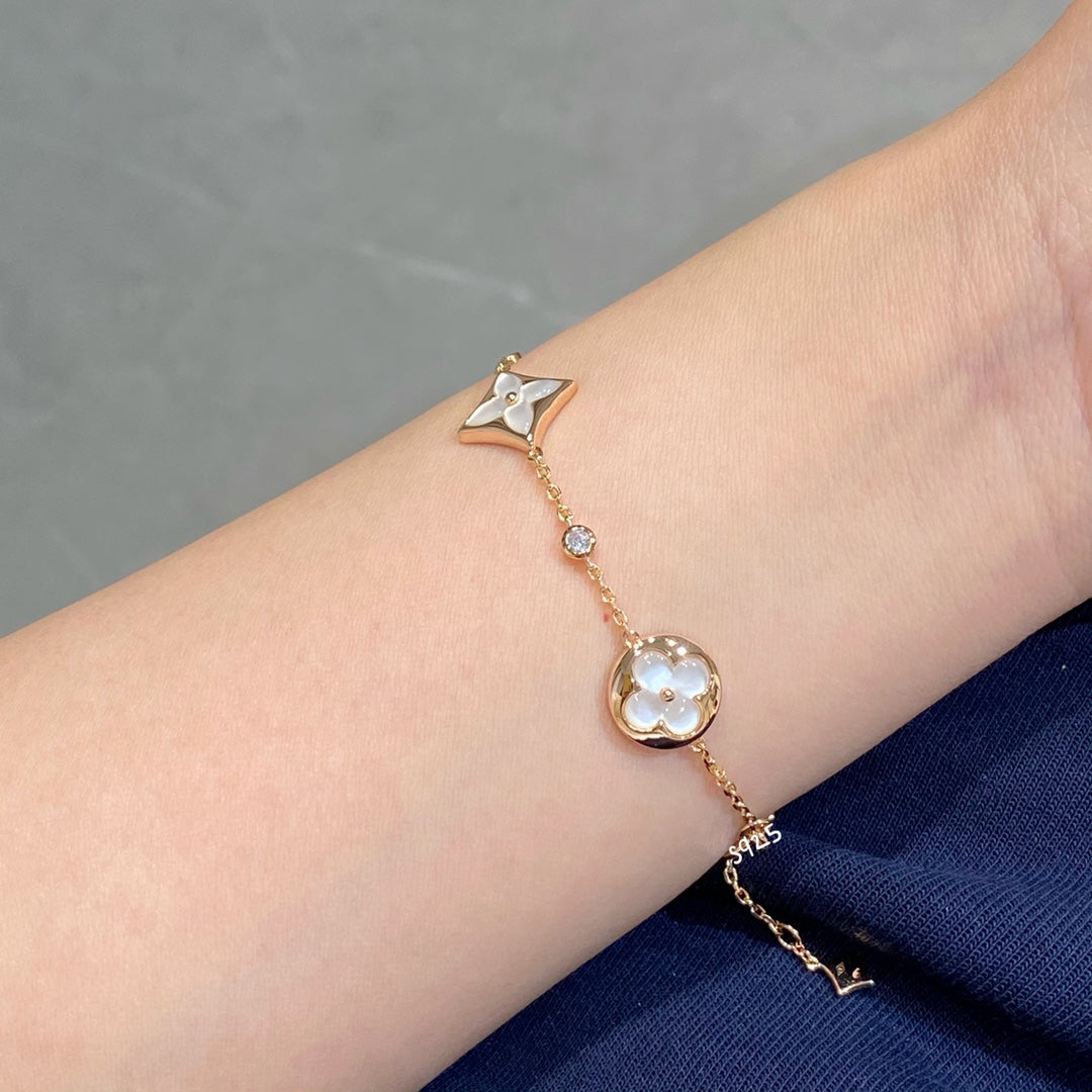 [AURORA]STAR AND SUN 4 MOTIF WHITE MOP PINK GOLD BRACELET