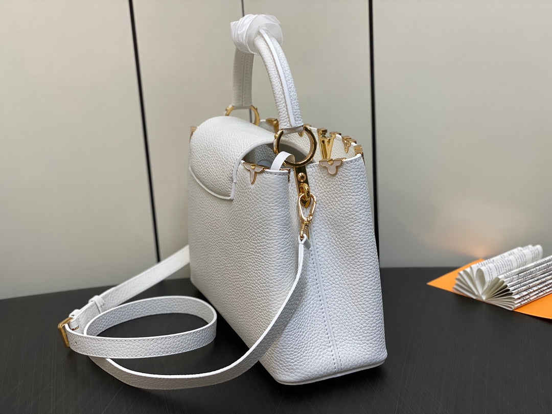 CAPUCINES MM 31 WHITE TAURILLON GOLD HARDWARE