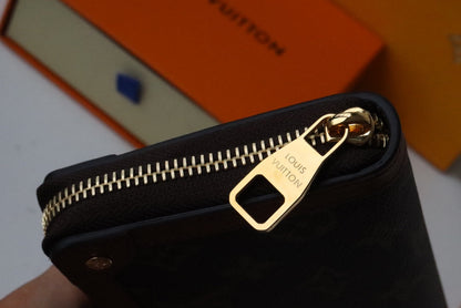 TRUNK ZIPPY WALLET 19.5 BROWN MONOGRAM CANVAS