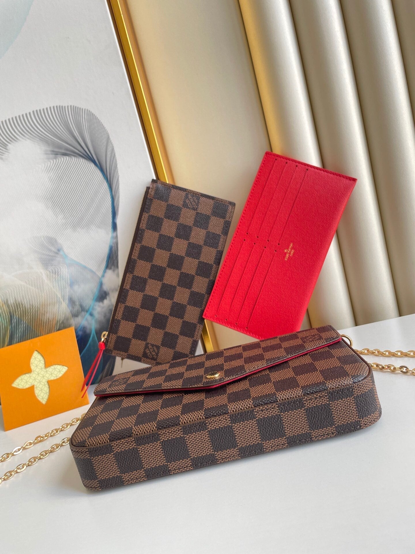 FÉLICIE POCHETTE 21 IN BROWN DAMIER EBENE COATED CANVAS GOLD HARDWARE