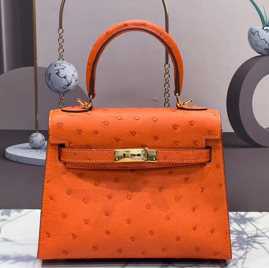 KELLY BAG 20 IN FIRE ORANGE OSTRICH LEATHER WITH GOLD HARDWARE (MADE-TO-ODER)