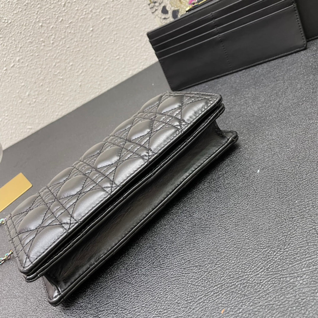 CARO SLIM POUCH 21 BAG IN BLACK CALFSKIN