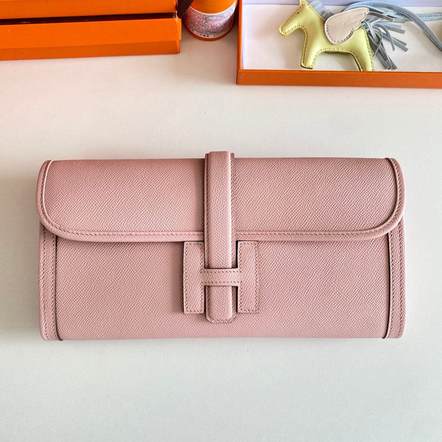 JIGE ELAN 29 CLUTCH IN CREPE PINK CALFSKIN