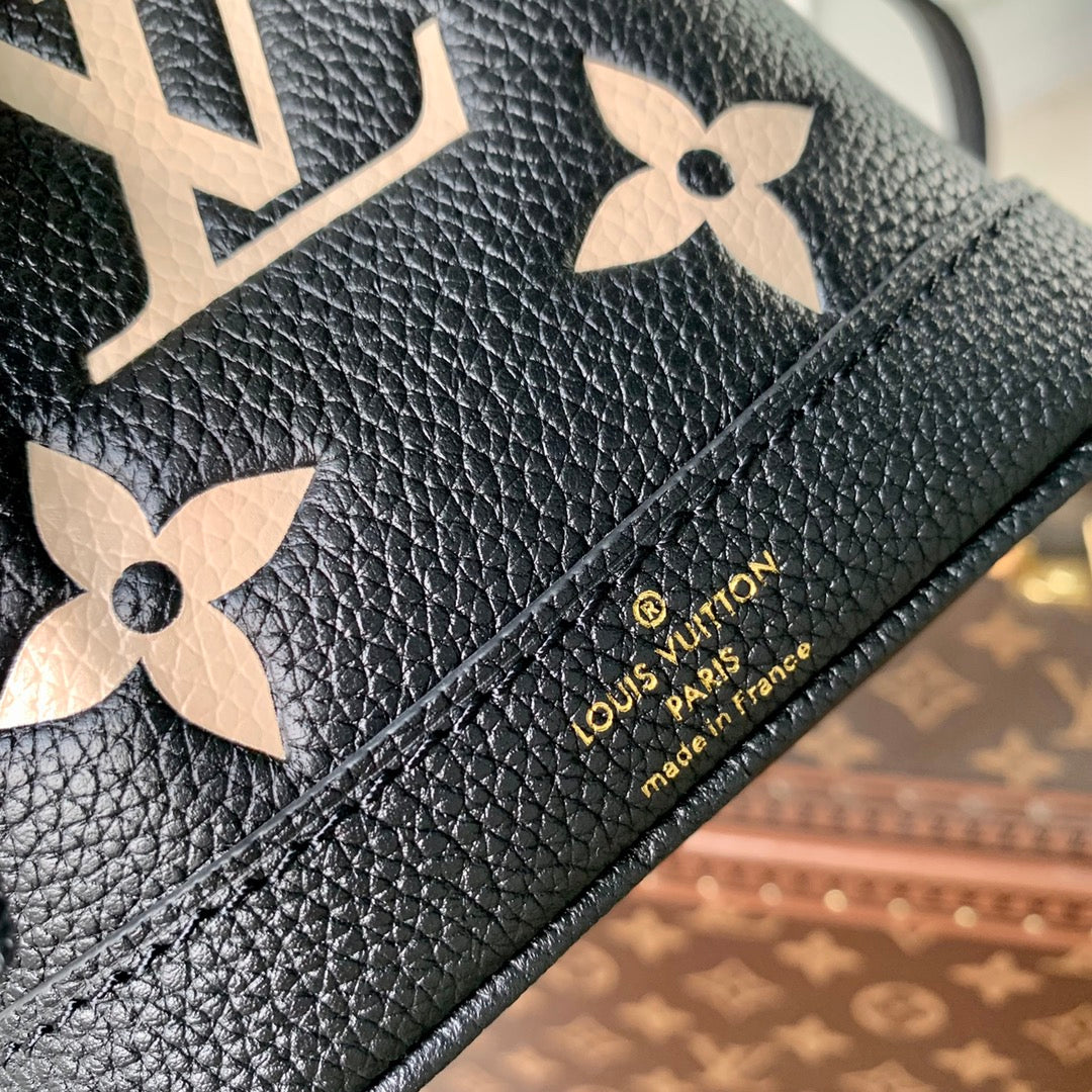NANO NOÉ 16 IN BLACK BEIGE BICOLOR MONOGRAM EMPREINTE CALFSKIN