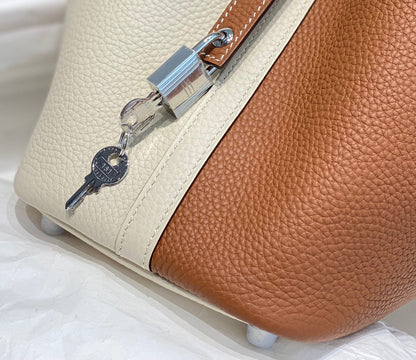 HERMES 25S PICOTIN LOCK 18 IN WHITE AND BROWN CALFSKIN SILVER HARDWARE
