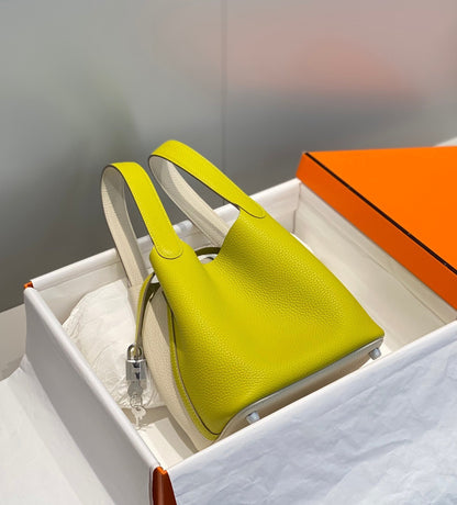 HERMES 25S PICOTIN LOCK 18 IN WHITE AND LEMON YELLOW CALFSKIN SILVER HARDWARE