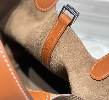 HERMES 25S PICOTIN LOCK 18 IN BURNT ORANGE AND BROWN CALFSKIN SILVER HARDWARE