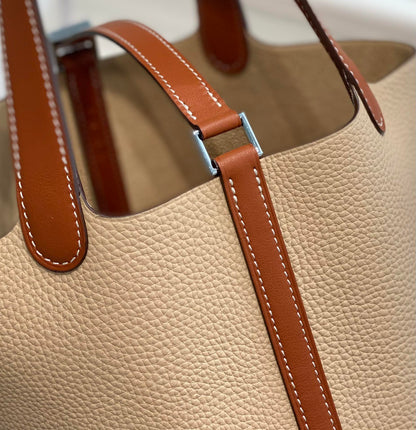 HERMES 25S PICOTIN LOCK 18 IN BURNT ORANGE AND LIGHT BROWN CALFSKIN SILVER HARDWARE