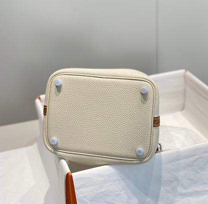 HERMES 25S PICOTIN LOCK 18 IN BURNT ORANGE AND IVORY CALFSKIN SILVER HARDWARE