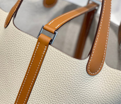 HERMES 25S PICOTIN LOCK 18 IN BURNT ORANGE AND IVORY CALFSKIN SILVER HARDWARE