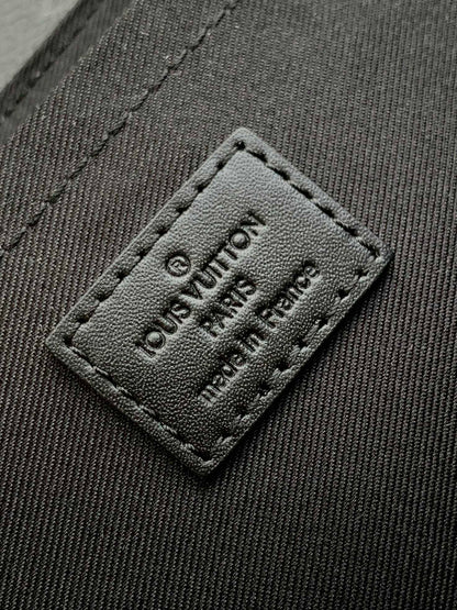 S-CAPE MESSENGER BAG 28 IN BLACK MONOGRAM ECLIPSE CANVAS