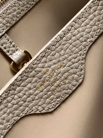 CAPUCINES BB 27 IN KHAKI BROWN TAURILLON GOLD HARDWARE