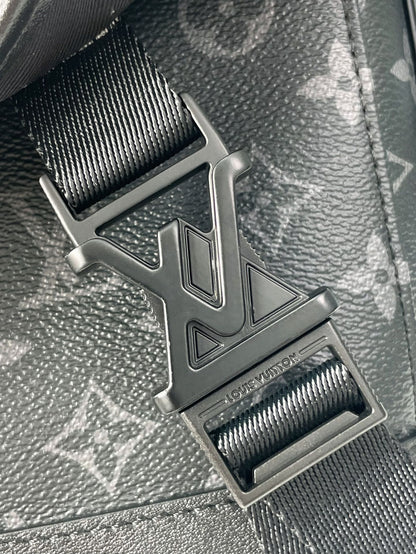 MESSENGER VOYAGER PM 33 IN GUN METAL MONOGRAM ECLIPSE CANVAS