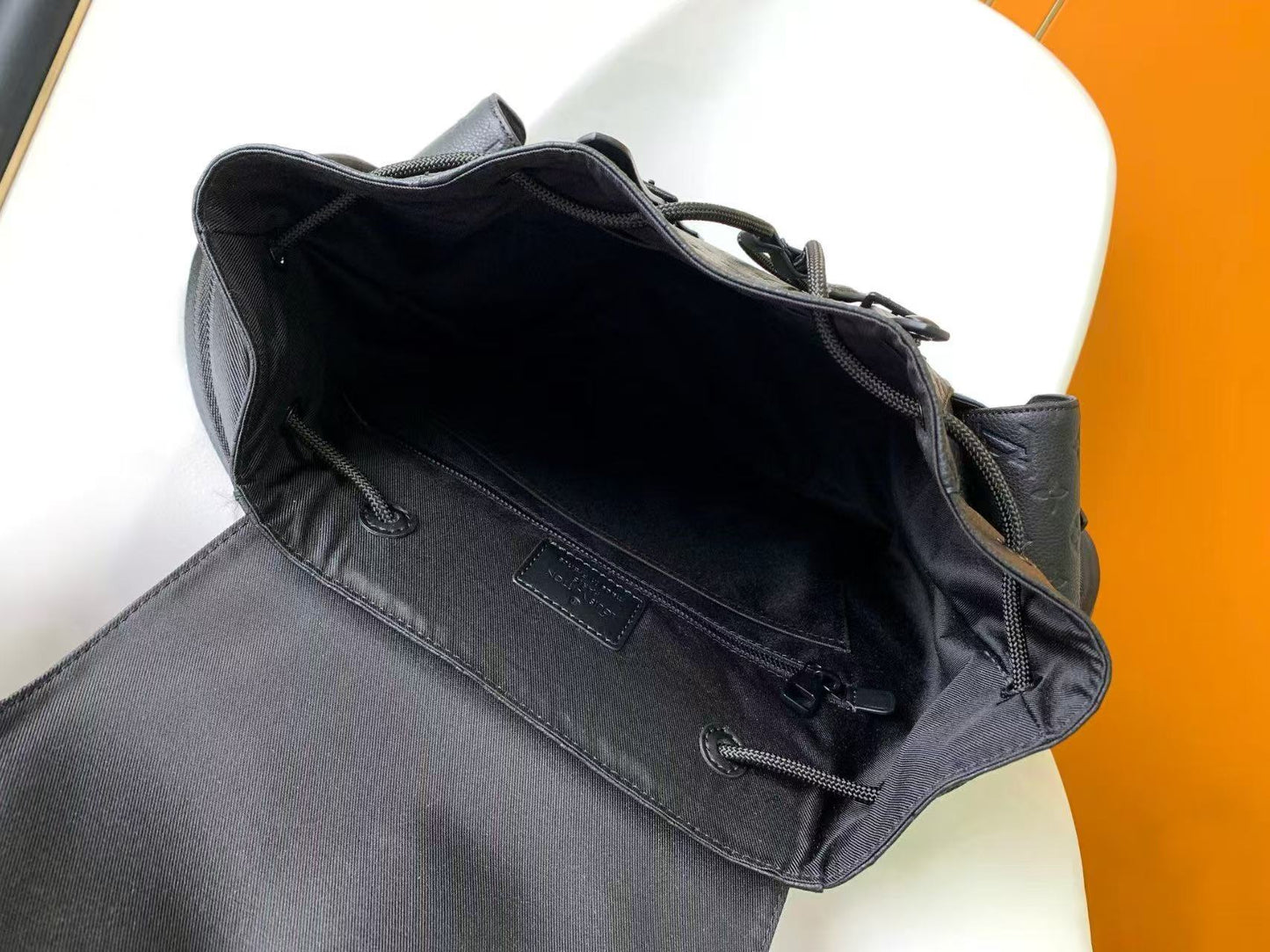 DISCOVERY BACKPACK 44 IN BLACK EMBOSSED MONOGRAM CALFSKIN