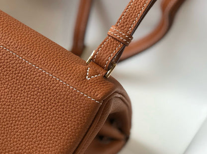 KELLY ADO 22 TOGO BACKPACK IN BROWN CALFSKIN GOLD HARDWARE