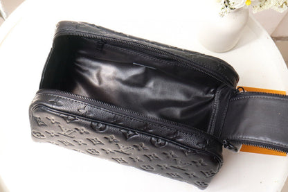 DOPP KIT TOILETRY BAG 28 CM IN BLACK TAURILLON MONOGRAM LEATHER