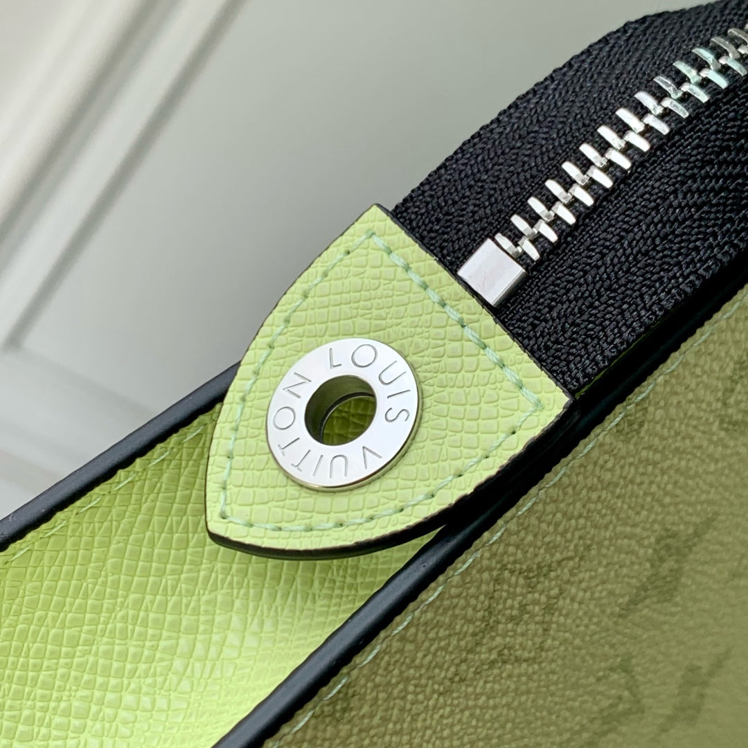 POCHETTE VOYAGE 26 IN LEMON YELLOW MONOGRAM ECLIPSE CALFSKIN