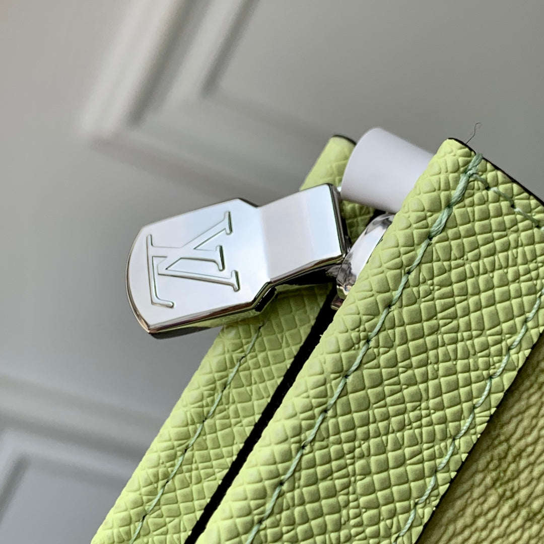 POCHETTE VOYAGE 26 IN LEMON YELLOW MONOGRAM ECLIPSE CALFSKIN