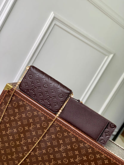 FÉLICIE POCHETTE 21 IN DARK BROWN MONOGRAM EMBOSSED LOGO CALFSKIN