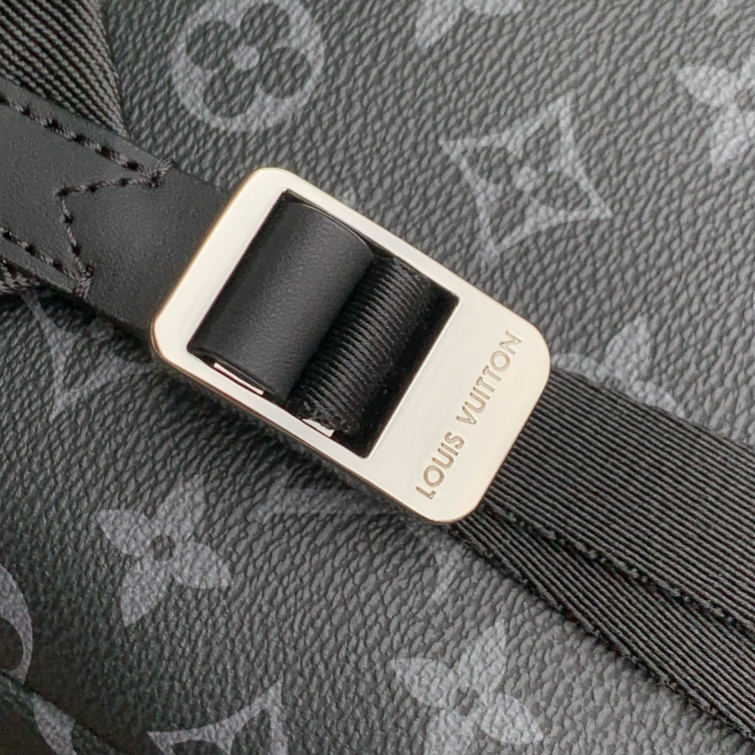 DISCOVERY SLIM BACKPACK 38 IN BLACK MONOGRAM ECLIPSE COATED CALFSKIN