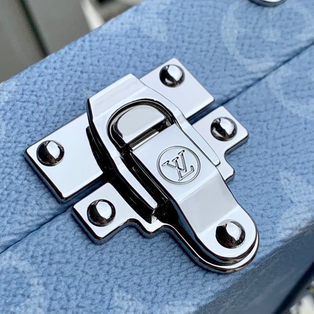 WALLET TRUNK TAIGARAMA 21.5 IN BLUE MONOGRAM COATED CANVAS