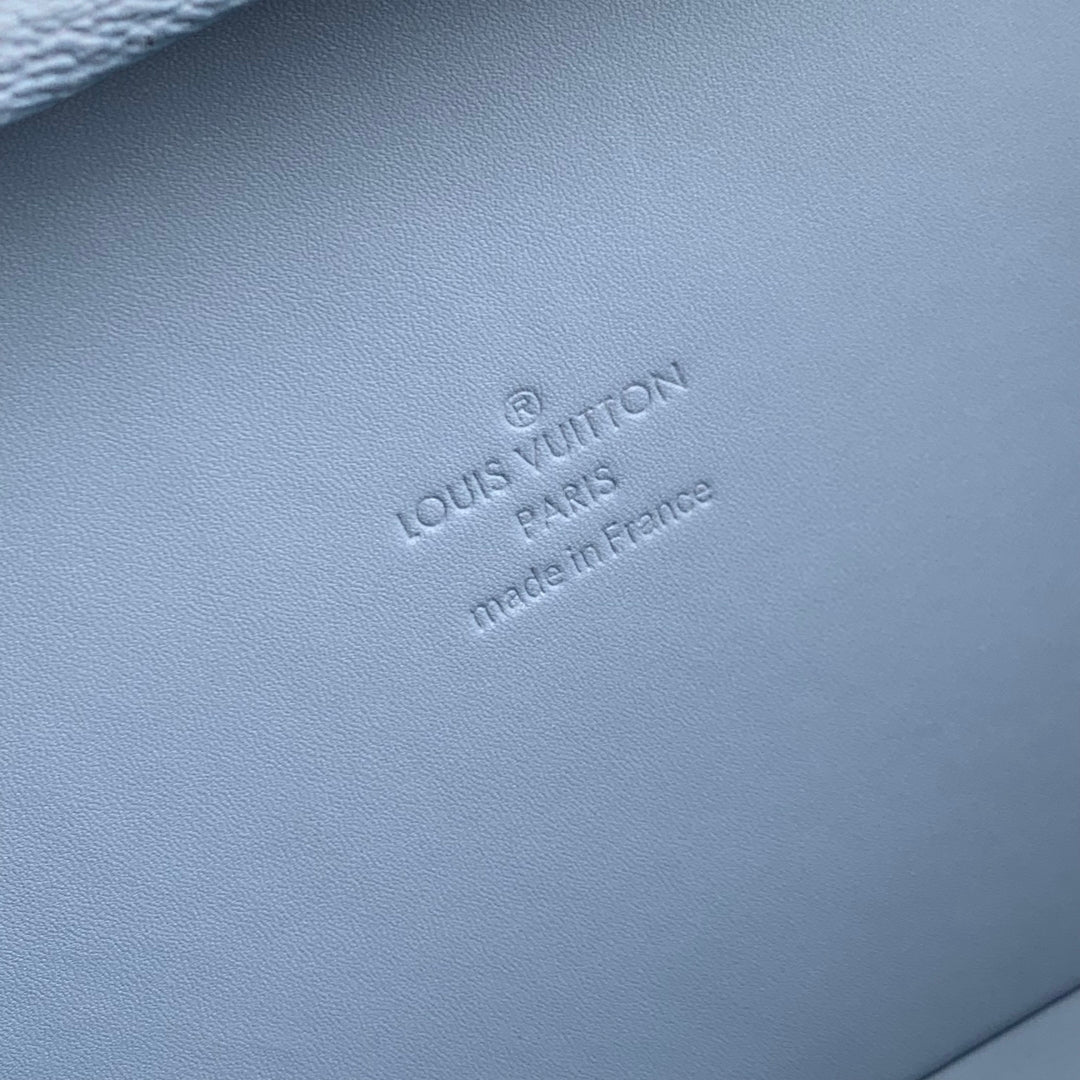 WALLET TRUNK TAIGARAMA 21.5 IN BLUE MONOGRAM COATED CANVAS