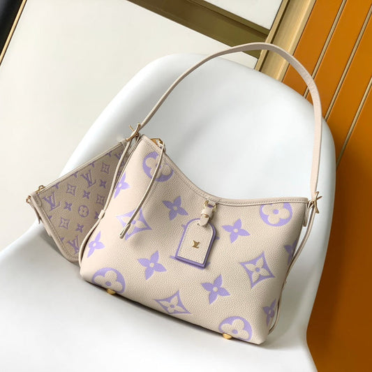 CARRYALL PM 29 BAG IN BEIGE MIX PURPLE MONOGRAM EMPREINTE LEATHER