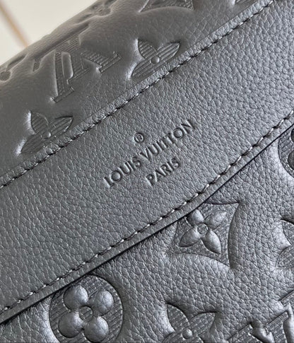 MESSENGER VOYAGER PM 33 IN BLACK MONOGRAM SHADOW CALFSKIN