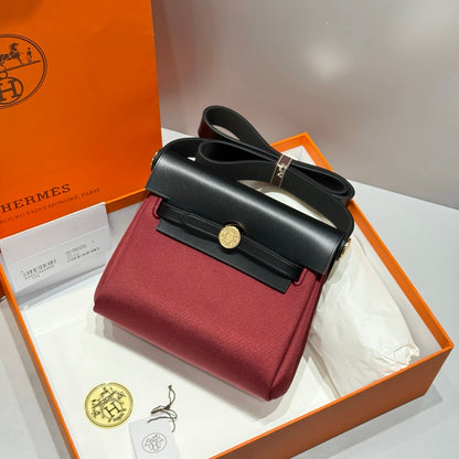 HERMES 25S MINI HERBAG 20 IN RED AND BLACK CANVAS GOLD HARDWARE
