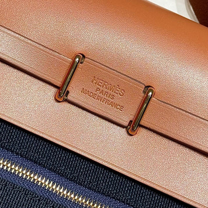 HERMES 25S MINI HERBAG 20 IN NAVY BLUE CANVAS GOLD HARDWARE