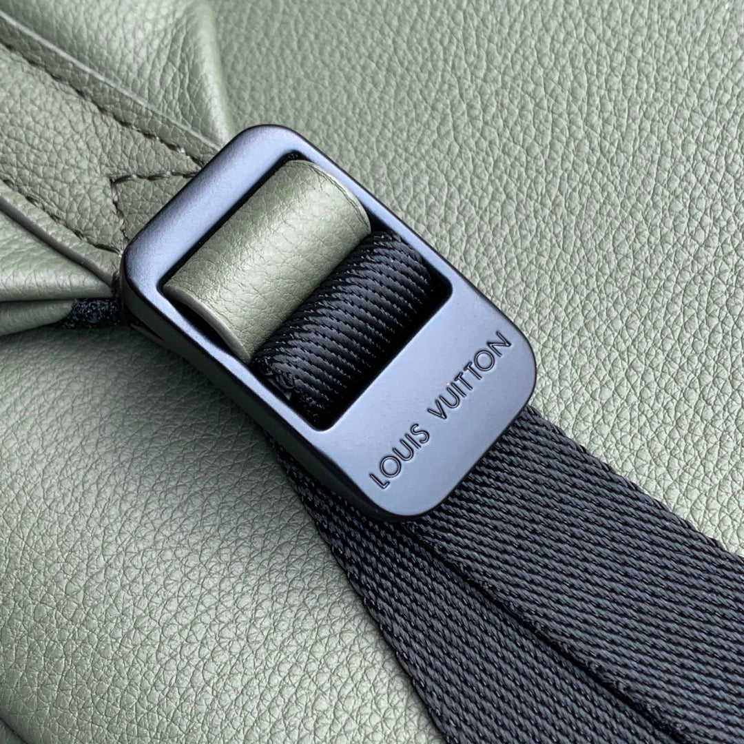 DISCOVERY PM BACKPACK 38 IN OLIVE GREEN MONOGRAM LAMBSKIN