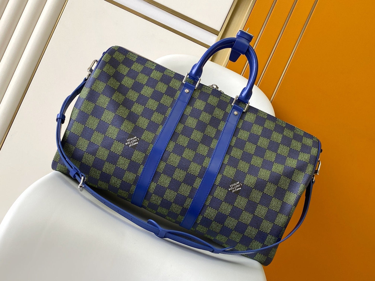 KEEPALL BANDOULIÈRE 50 IN BLUE GREEN DAMIER HERITAGE COATED CANVAS