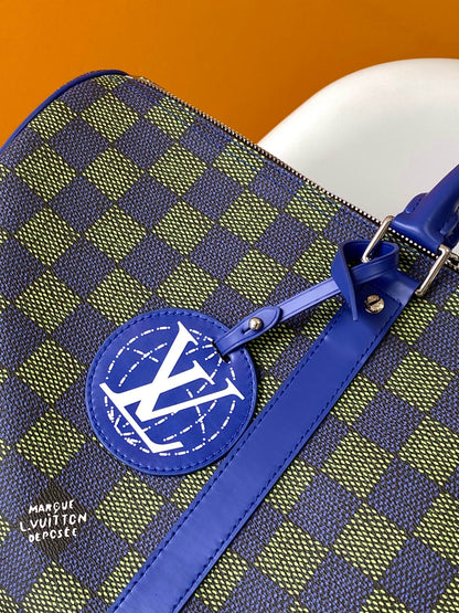 KEEPALL BANDOULIÈRE 50 IN BLUE GREEN DAMIER HERITAGE COATED CANVAS