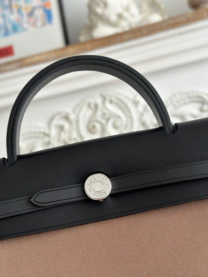 ZIP CABINE 31 BAG IN CHOCOLATE BROWN CANVAS AND BLACK CALFSKIN