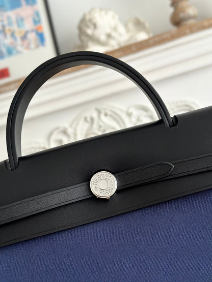 ZIP CABINE 31 BAG IN NAVY BLUE CANVAS AND BLACK CALFSKIN