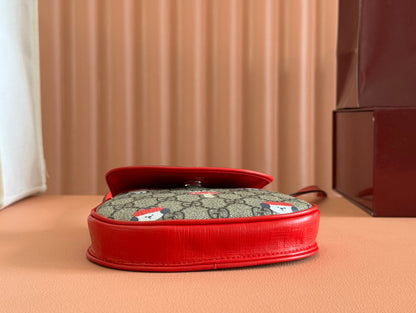 CHILDREN'S PRINTED GG SHOULDER BAG IN BEIGE AND DARK BROWN GG CANVAS RED TRIM