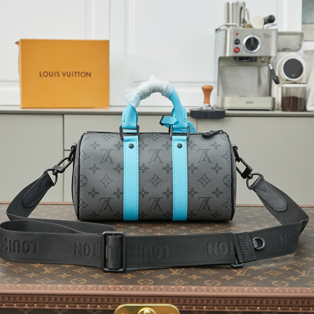 KEEPALL BANDOULIÈRE 25 IN GUN METAL MONOGRAM ECLIPSE CANVAS MIX TURQUOISE CALFSKIN