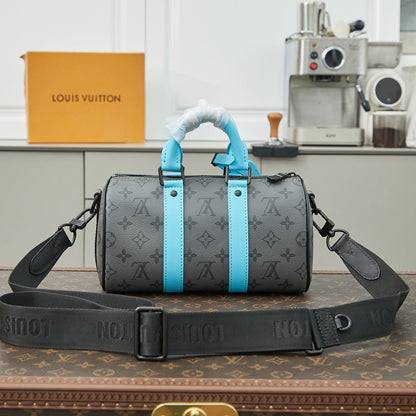 KEEPALL BANDOULIÈRE 25 IN GUN METAL MONOGRAM ECLIPSE CANVAS MIX TURQUOISE CALFSKIN