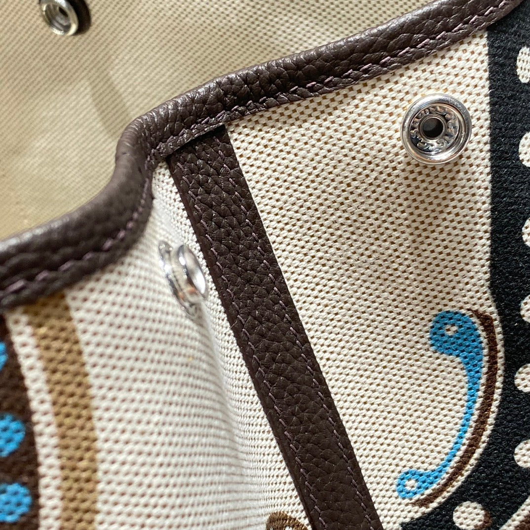 GARDEN PARTY 36 IN MULTICOLOR TOILE H CANVAS DARK BROWN CALFSKIN ABSTRACT GRAPHIC PRINT