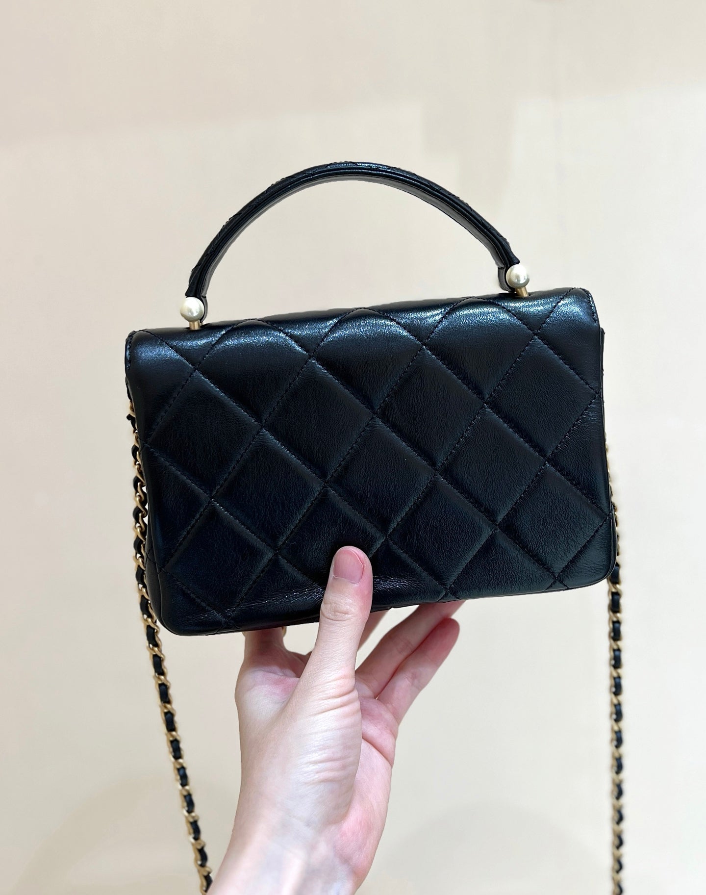 PEARL LIMITED EDITION FLAP BAG WITH HANDLE 20 IN BLACK LAMBSKIN